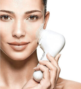 Lady using Clarisonic Mia2 Facial Cleanser