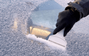 scraping frost off windscreen